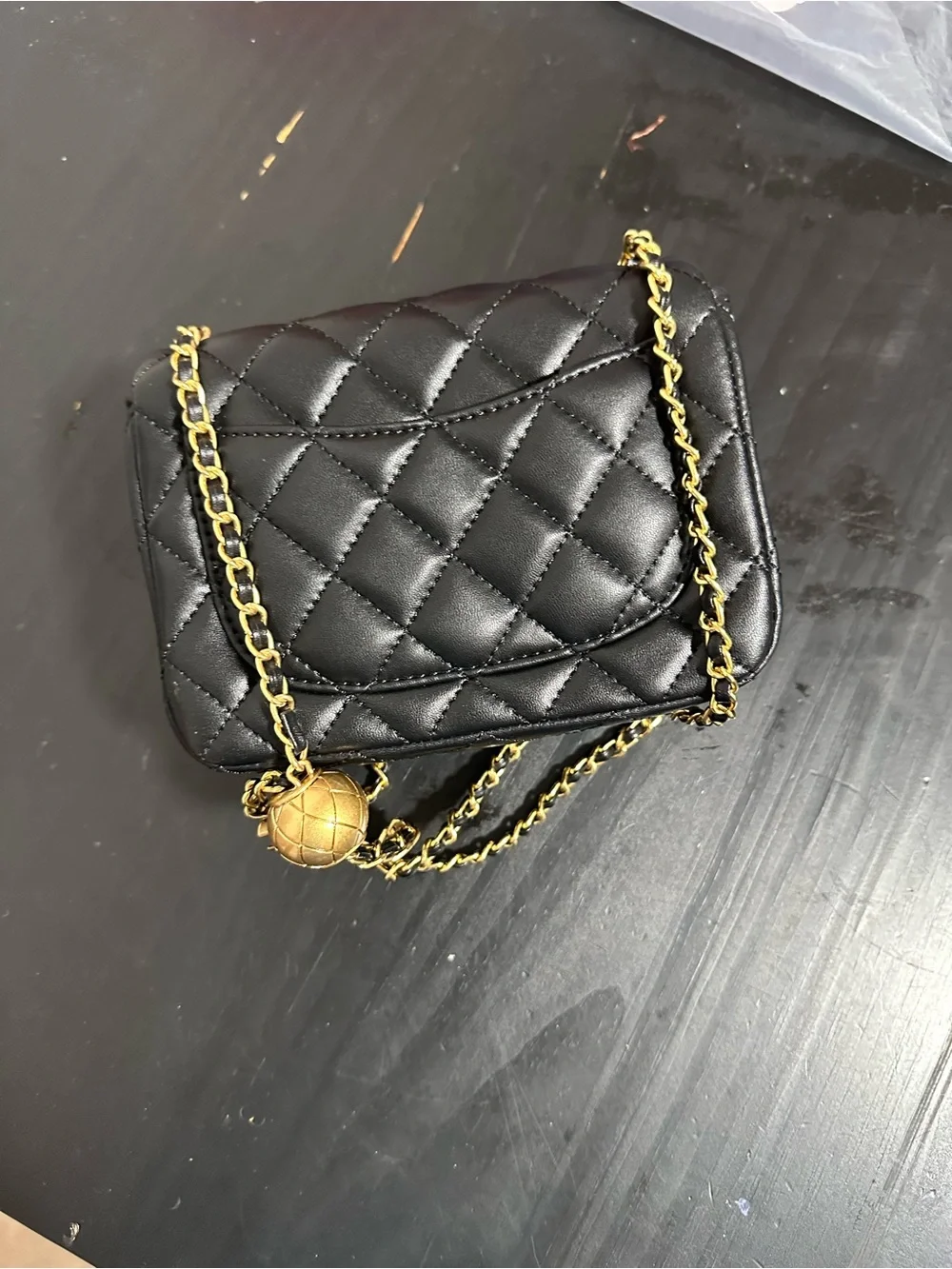 CHANEL Black Quilted Mini Crossbody with Gold Chain